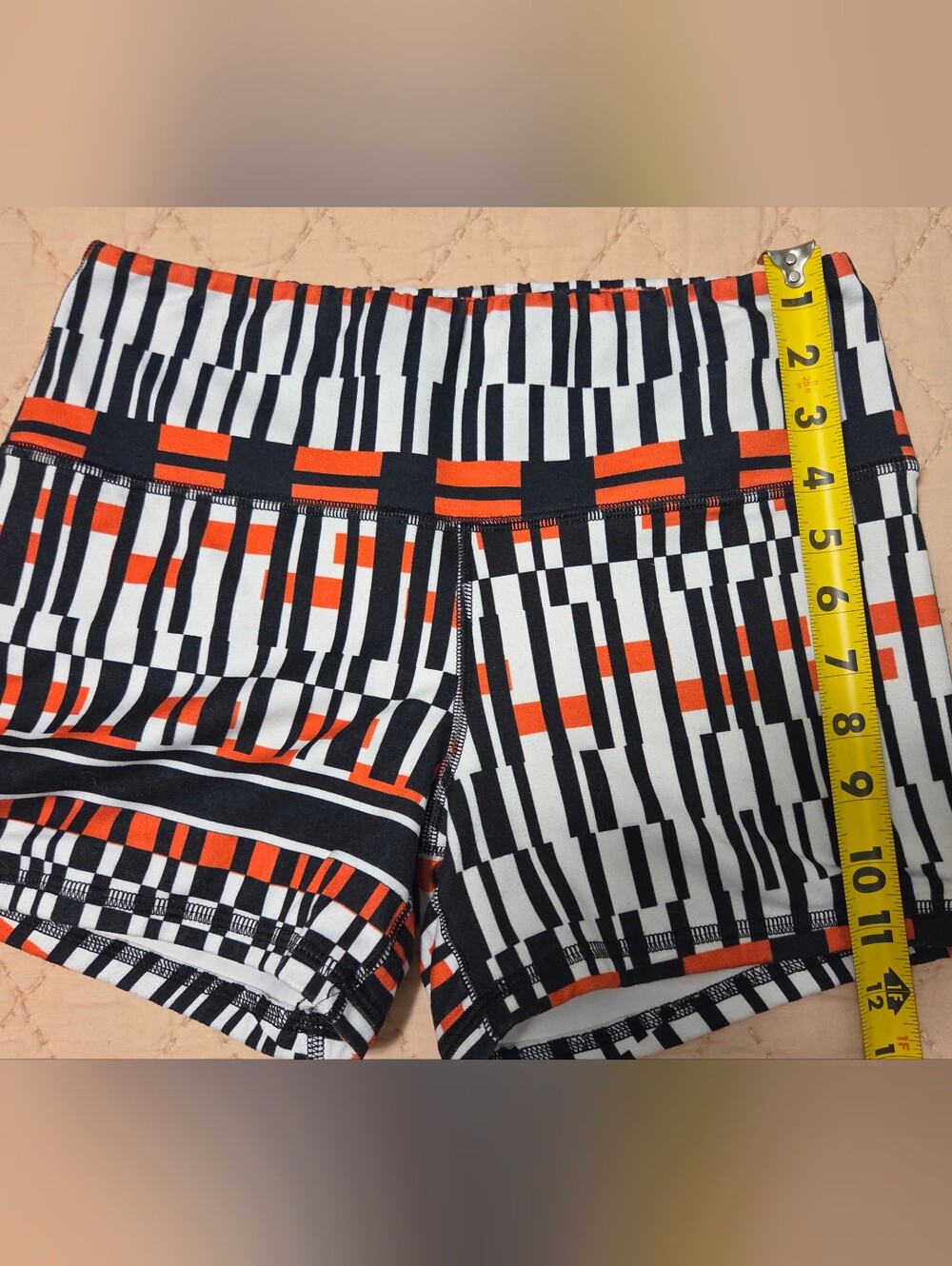 Fleo Women’s Black, White & Orange Geometric Athletic Shorts